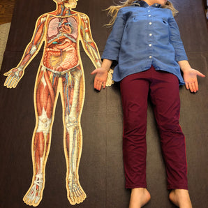 full size of the Full-Body Floor Puzzle compared to a child